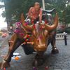 NYPD Fines Putin-Masked Prankster Who Covered 'Charging Bull' With Dildos